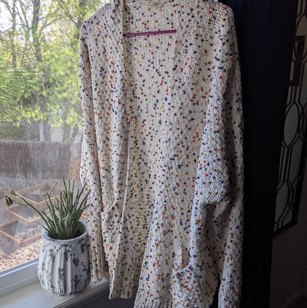 Cute white rainbow spot sweater